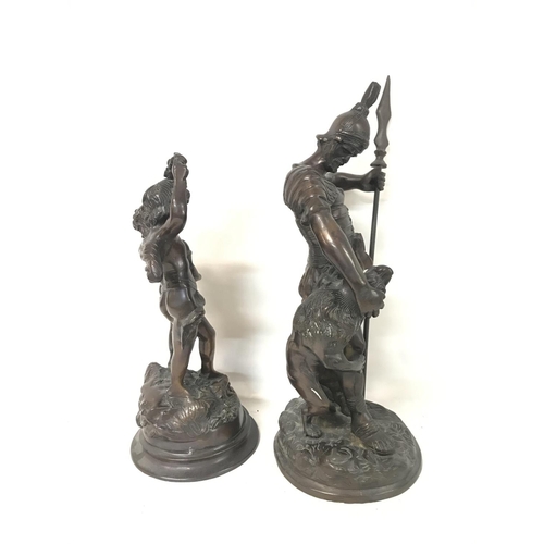 898 - Two spelter figures, a Greek warrior (42cm tall) & two children (32cm tall).