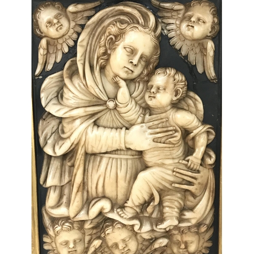 899 - Early Alabaster cased panel of Madonna & a child, 33x43cm approximately. (D)