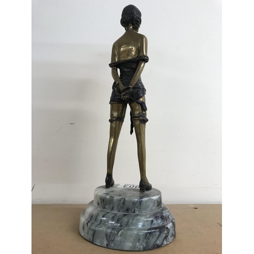 903 - An Art Deco style maiden on marble base. Height 32cm