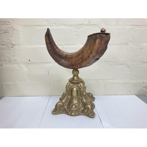 913 - Rams horn snuff mull on Gilt metal base, approximately 30cm tall.