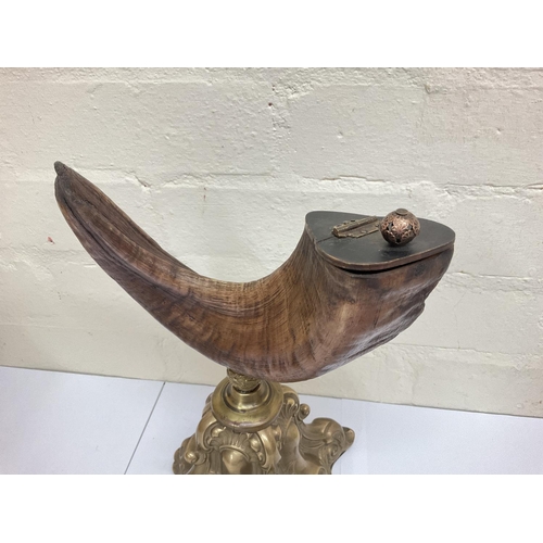 913 - Rams horn snuff mull on Gilt metal base, approximately 30cm tall.