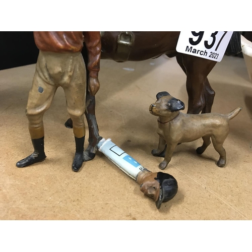 937 - A novelty lighter in the form of a jockey with horse and dog. The Jockeyâs head is detachable