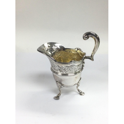 941 - A Victorian silver jug with engraved decoration, London hallmarks, approx height 12cm, approx 137.14... 