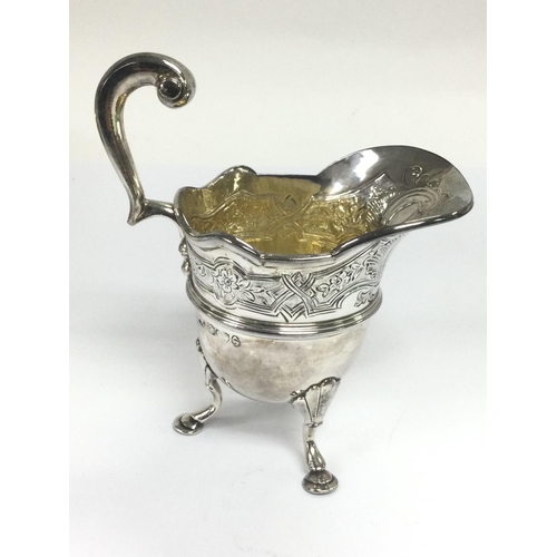 941 - A Victorian silver jug with engraved decoration, London hallmarks, approx height 12cm, approx 137.14... 