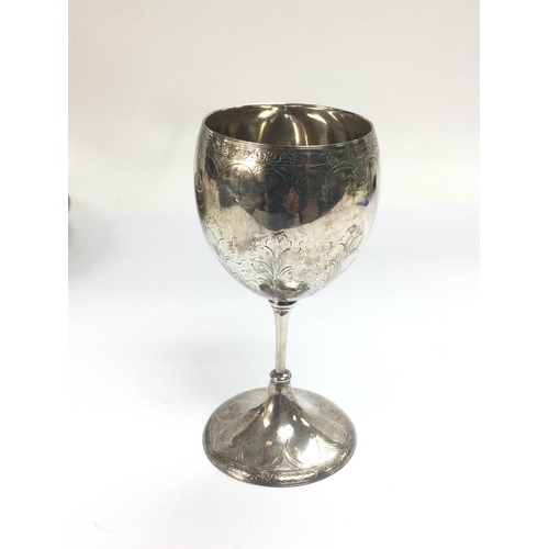 944 - A silver goblet wit engraved decoration, approx 14cm and approx 147.54g.