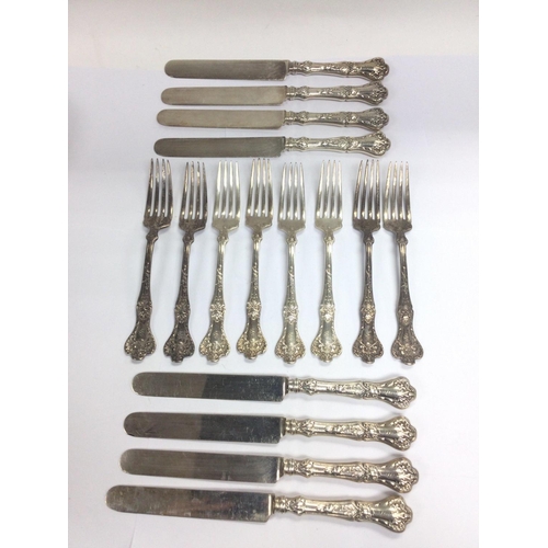 949 - A 16 piece set of Gorham silver knives and forks.Shipping category B.