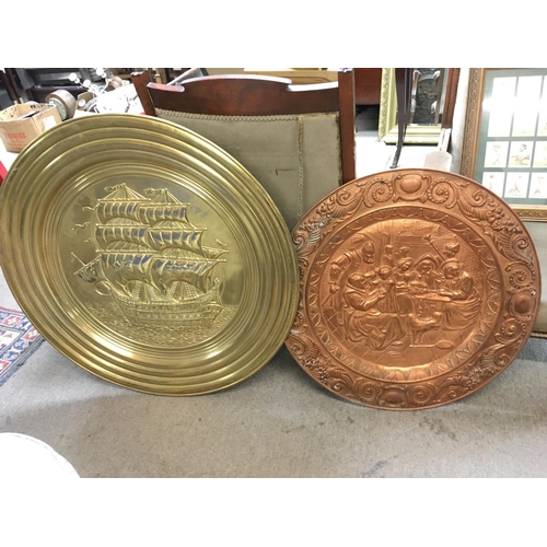 954 - Bronze and copper plates with a ship and dinner scenes. Approximate diameters of 88 & 70cm (D)