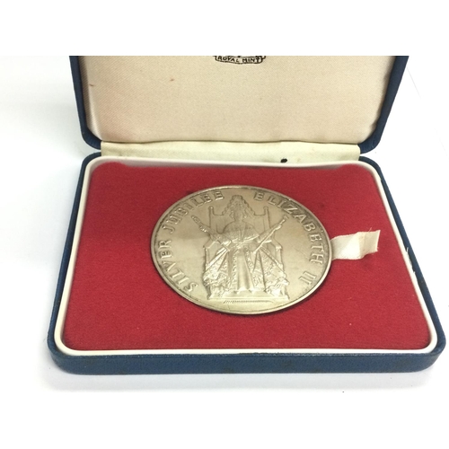 961 - A boxed silver QE2 Coronation medal.