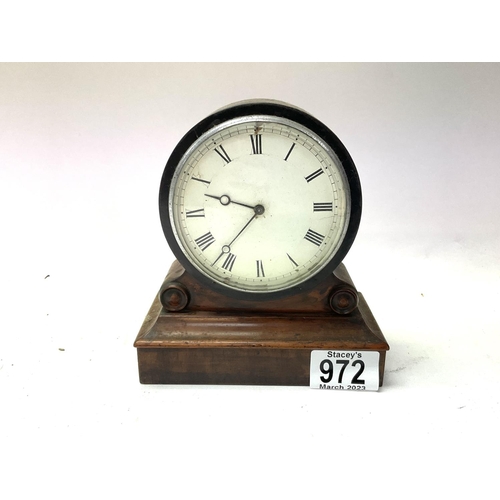 972 - A small French mahogany veneered barrell style mantle clock. 16cm, Cat D.