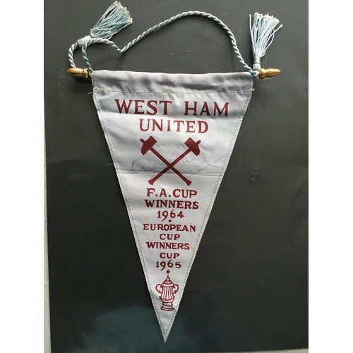 1087 - Bobby Moore Signed 1965 ECWC Football Pennant: Small West Ham pennant stating 1964 FA Cup and 1965 E... 