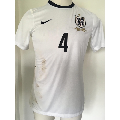 13 - Steven Gerrard England Match Worn Football Shirt: White short sleeve shirt with number 4 Gerrard to ... 