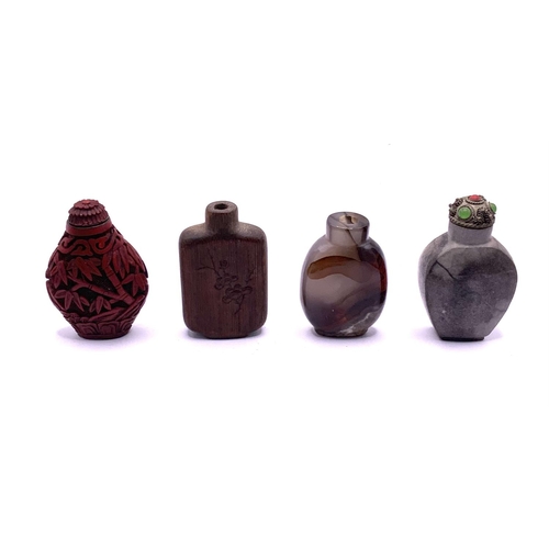 102 - 4 good early 20thC Chinese snuff bottles to include a Cinnabar lacquered example, Carved bamboo, Pol... 