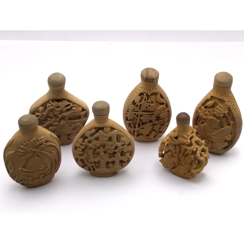 14 - A selection (6) of boxwood carved snuff bottles, variation on subjects. 5.8cm - 7.5cm.