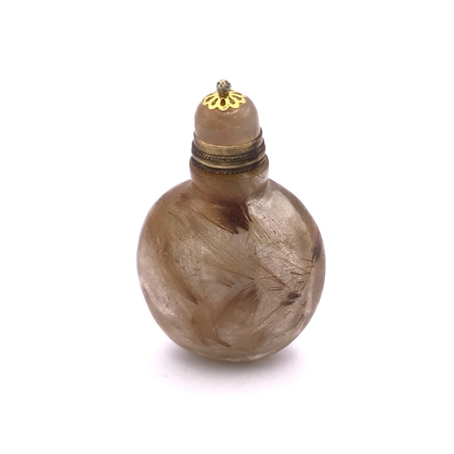 15 - A 19thC Chinese hair crystal snuff bottle with rounded form, 4.9cm