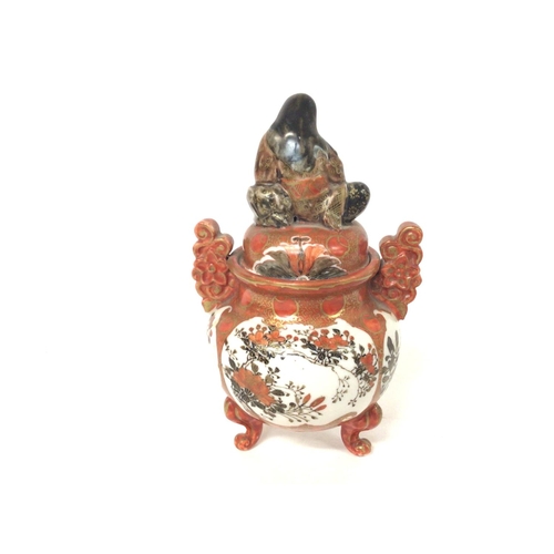 161 - A Japanese 19th century Kutani Koro with figure on lid, approximately 15cm tall. Postage cat D