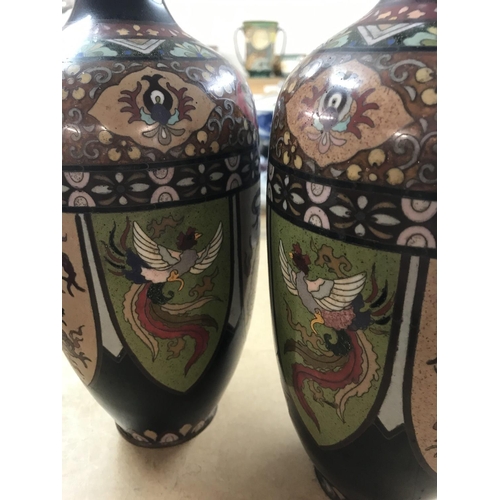 167 - A pair of cloisonnÃ© vases decorated with birds flowers and foilage 30 cm .