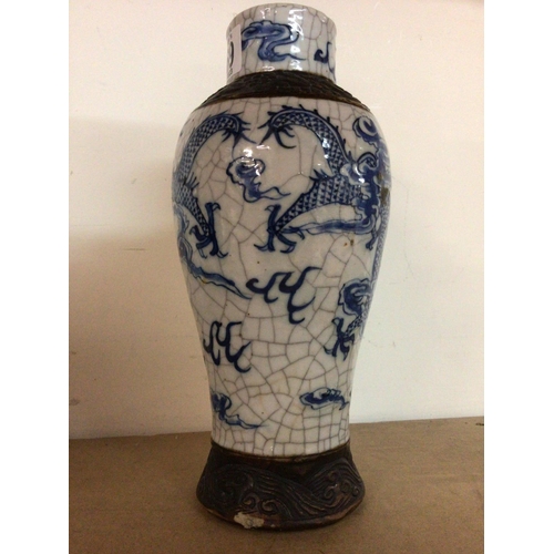 169 - A Chinese crackle glaze vase decorated with dragons 28cm- slight chip to the base