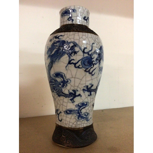 169 - A Chinese crackle glaze vase decorated with dragons 28cm- slight chip to the base