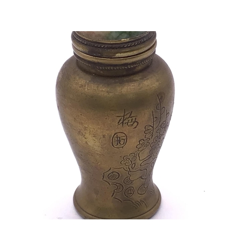 19 - An early 20thC Chinese Bronze snuff bottle with engraved apple blossom decoration, signature panel t... 