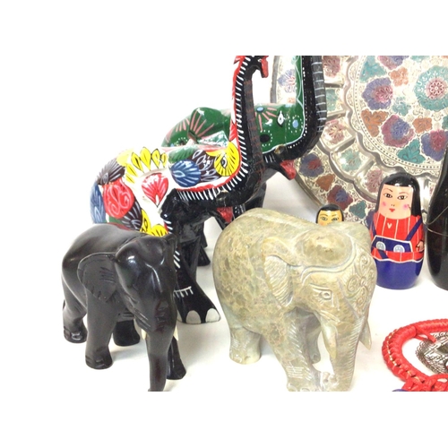 198 - Modern Middle Eastern ornaments consisting of elephant figures, a Kutahya Turkish ceramic ball, a Ja... 