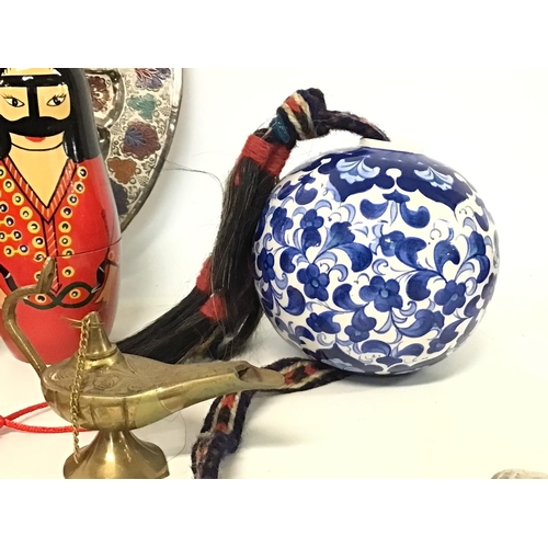 198 - Modern Middle Eastern ornaments consisting of elephant figures, a Kutahya Turkish ceramic ball, a Ja... 