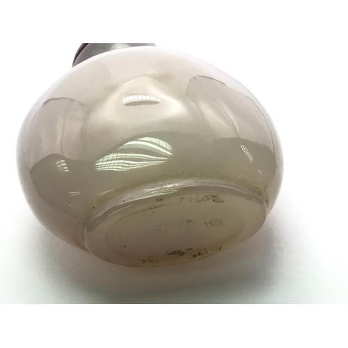 3 - A polished agate bottle with a natural darkened area in the form of a duck. 4.8cm.