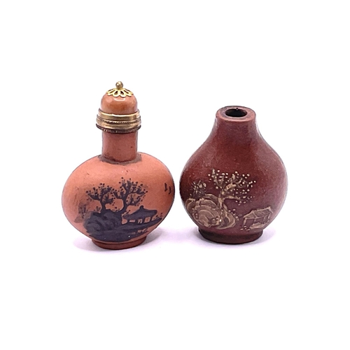 31 - 2 early 20th century Yi-Xing terracotta snuff bottles with slip decoration. 4.5cm.