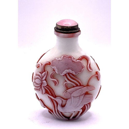 35 - A 2 layered milk glass cameo glass snuff bottle with decoration of Cranes and flowers, signature pan... 