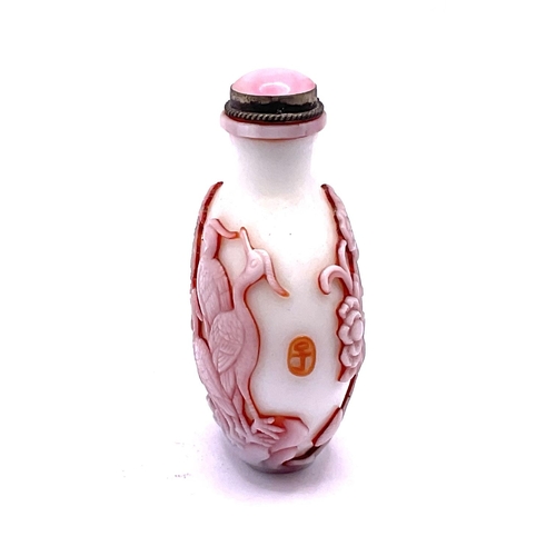 35 - A 2 layered milk glass cameo glass snuff bottle with decoration of Cranes and flowers, signature pan... 