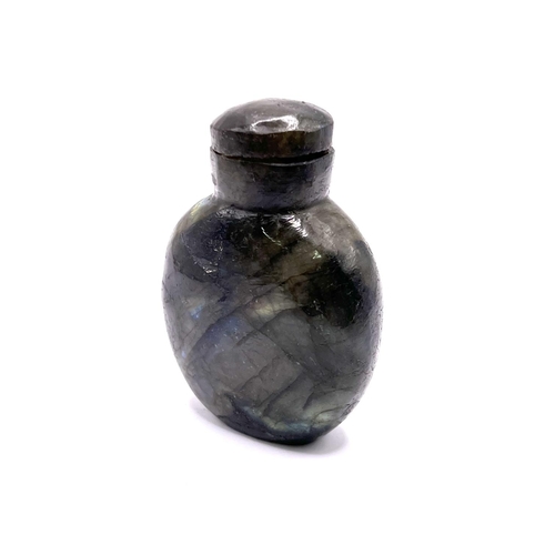 37 - A polished labradorite snuff bottle with matching stopper, 6.5cm.