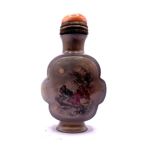 39 - A finely carved and polished inside painted agate snuff bottle in cloud form, with brass mounted cor... 