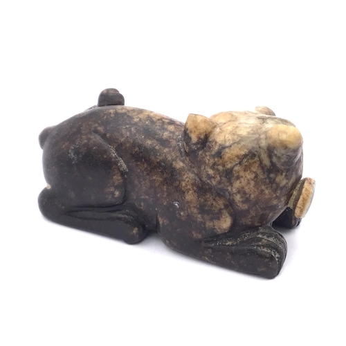 7 - A carved hard stone snuff bottle in the form of a cat. 7.5cm