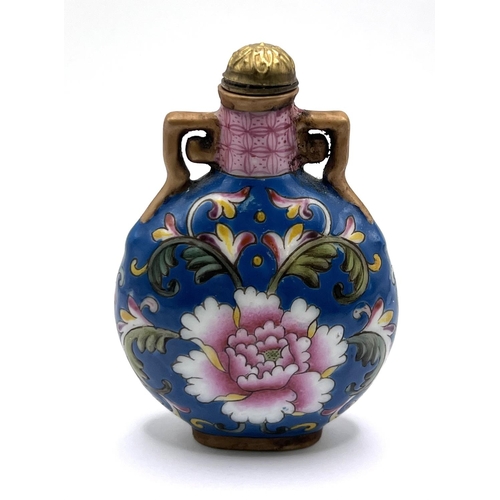 71 - A fine hand painted famille rose porcelain snuff bottle with floral design. 7.5cm.