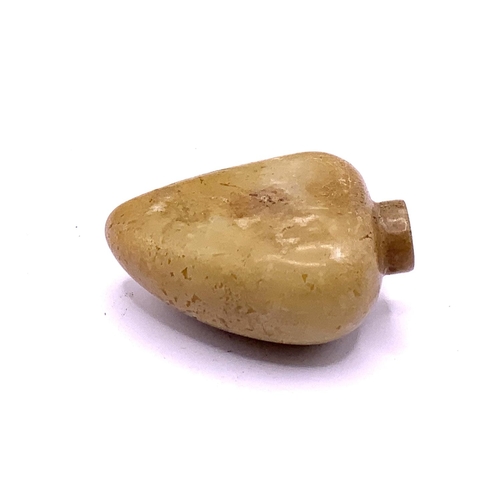 90 - A 19thC polished nephrite pebble snuff bottle. 5.5cm.