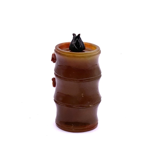 91 - A carved agate snuff bottle in the from of a bamboo shoot. 6cm.