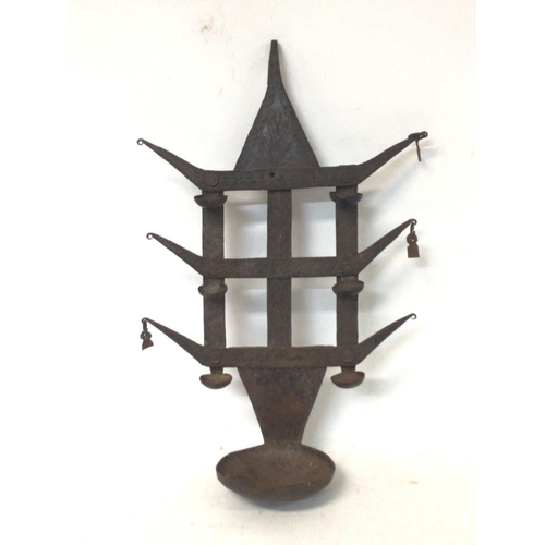 1329 - Wrought iron benin lamp, 54cm tall.