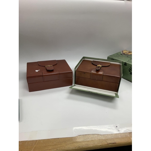 1332 - Two Rolex boxes with buckles on the top and a Rolex velvet sleeve. Shipping category C.