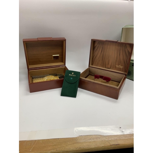 1332 - Two Rolex boxes with buckles on the top and a Rolex velvet sleeve. Shipping category C.