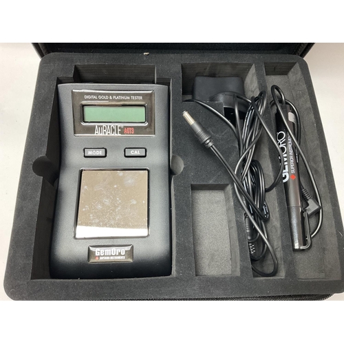 1344 - An AuRACLE AGT3 digital gold and platinum tester. No guarantees on current working condition can be ... 