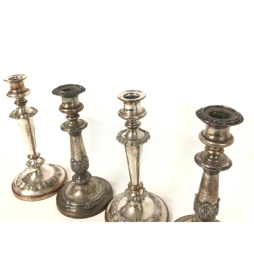 1346 - Two pairs of Victorian Sheffield plated candlesticks, approximately 24cm tall. Cat C Postage