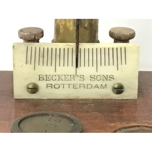 1350 - Vintage set of apothecary scales by Beckers sons Rotterdam and a small box of brass weights, postage... 