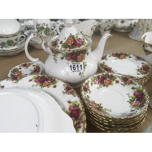 1611 - A Royal Albert old English country rose tea set and dinner plate set six place setting and tea pot.