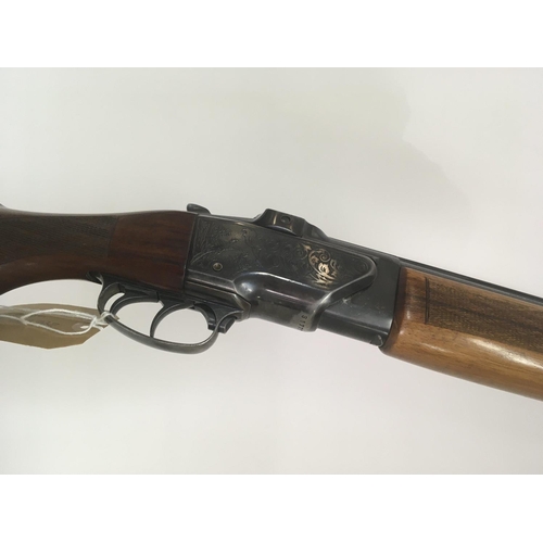 2147 - A 12bore over and under shot gun walnut stock with double trigger and ejector fixed choke R/H with a... 