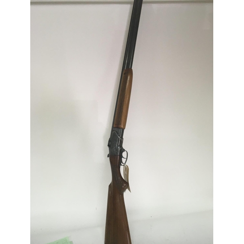 2147 - A 12bore over and under shot gun walnut stock with double trigger and ejector fixed choke R/H with a... 