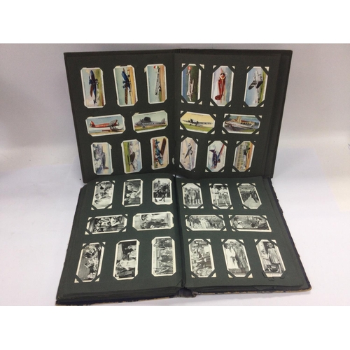 2486 - A box of various cigarette card albums. Various subjects including football, speedway and others. Sh... 