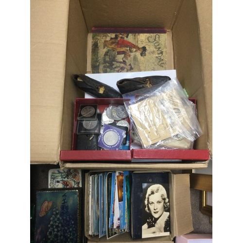 2487 - A box of various ephemera including postcards, stamps, coins etc. Shipping category D.