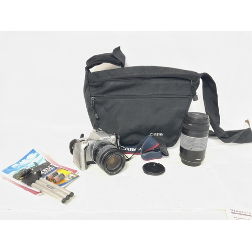 2489 - Canon EOS 300V camera cased with accessories , postage cat C