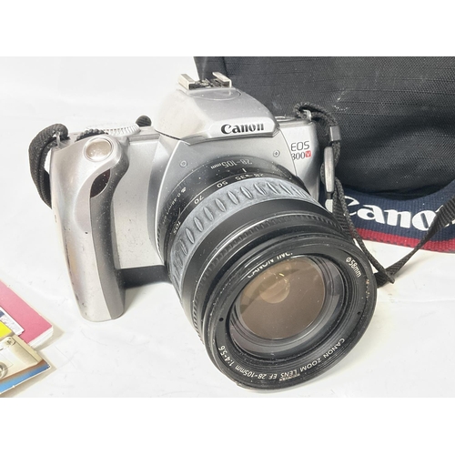 2489 - Canon EOS 300V camera cased with accessories , postage cat C