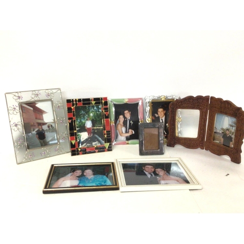 2490 - A collection of photograph frames. Postage cat D