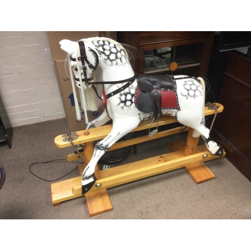 2498 - A painted wooden rocking horse. Shipping category D.